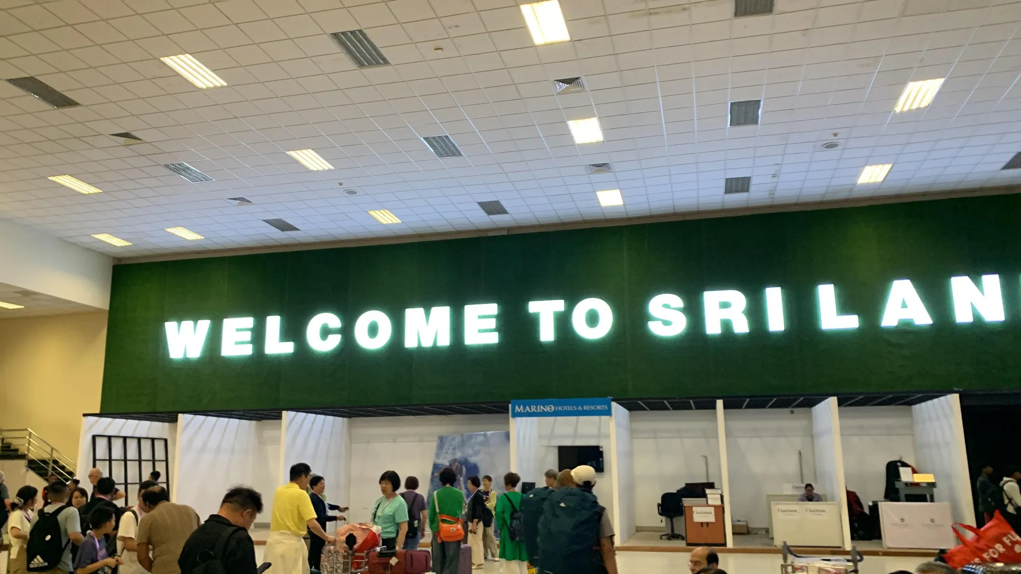 WELCOME TO SRI LANKA sign inside the arrival area